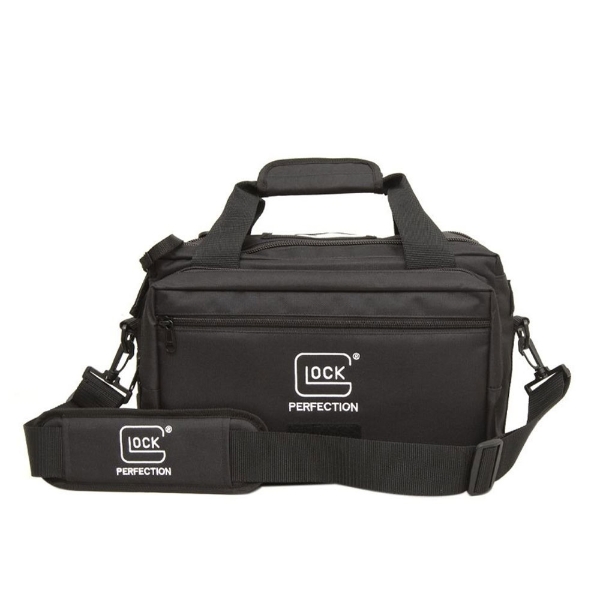 Front view of a black GLOCK range bag with zippered compartments, reinforced handles, and a padded shoulder strap featuring the GLOCK Perfection logo.